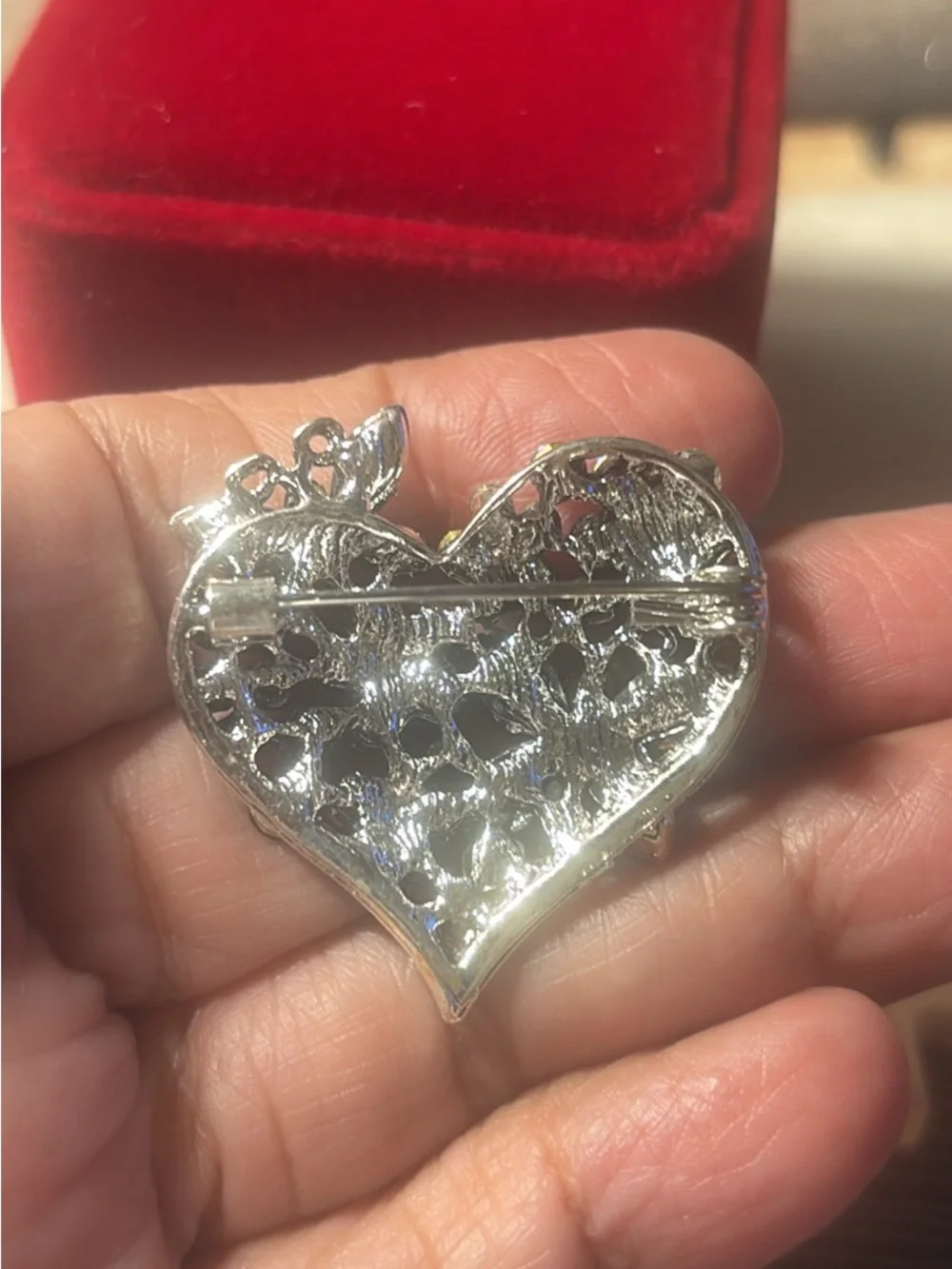 Heart-Shaped Blue Crystal Brooch with Floral and Butterfly Motifs